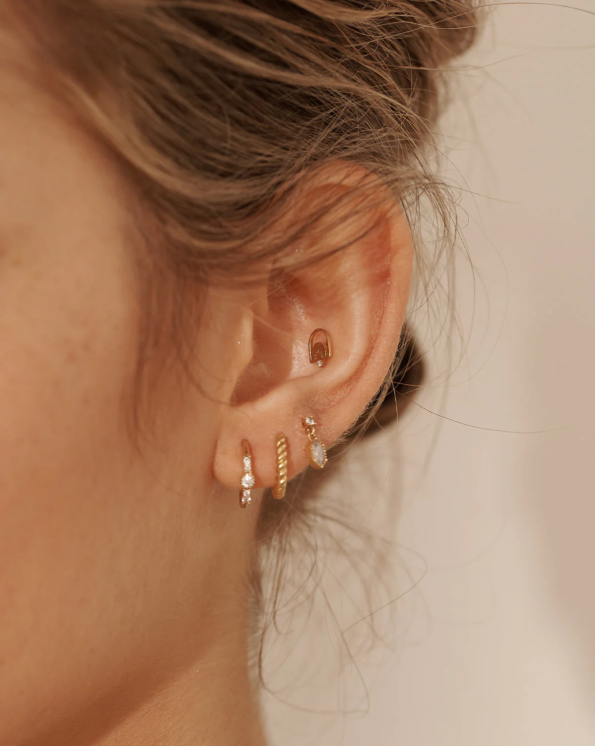 Bella Twist Huggie Hoops - Image 6